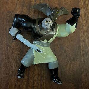 McDonald's Happy Meal toy featuring Shan Yu Action Figure with Sword and Bat